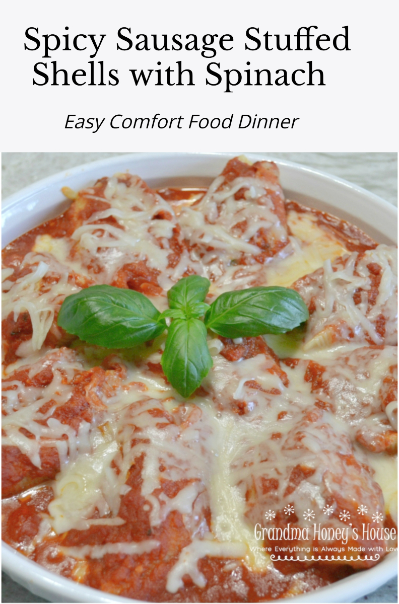 These Spicy Sausage-Spinach Stuffed Shells are the ultimate comfort food dinner! Jumbo pasta shells are filled with a cheesy sausage and spinach mixture, topped with sauce, and baked until bubbly.