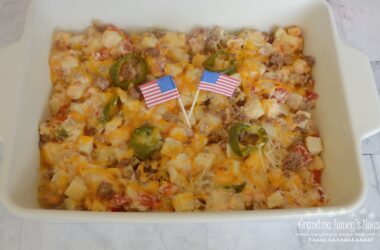Firecracker Potato Casserole has Frozen Potatoes O Brien,  Rotel,  spicy sausage, sour cream, butter, jalapenos, and lots of cheese. Perfect for BBQ's.