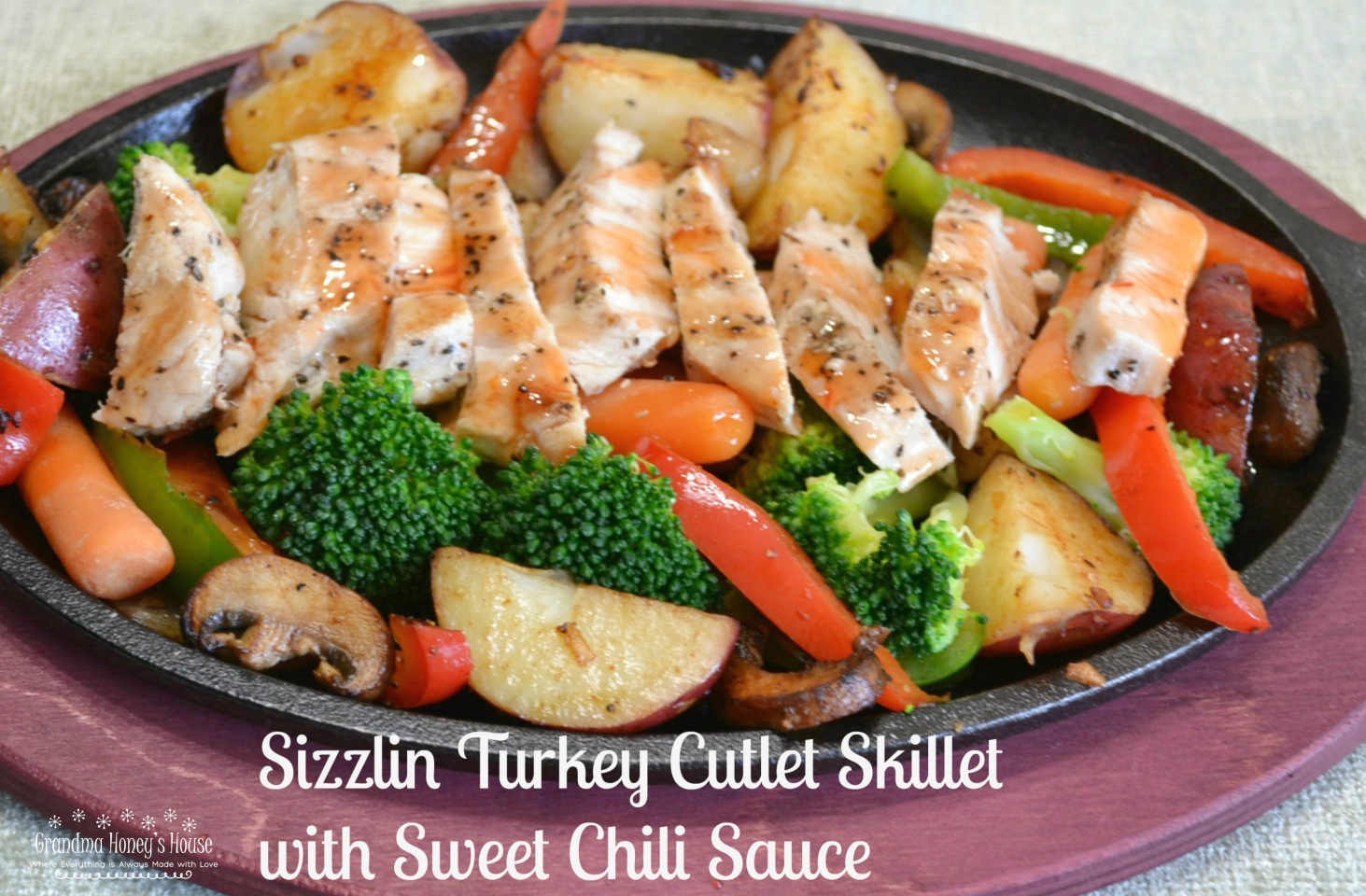 Sizzlin Turkey Cutlet Skillet. A healthy, colorful skillet dinner of fresh veggies, grilled turkey cutlets served on a cast iron skillet and drizzled with sweet chili sauce.