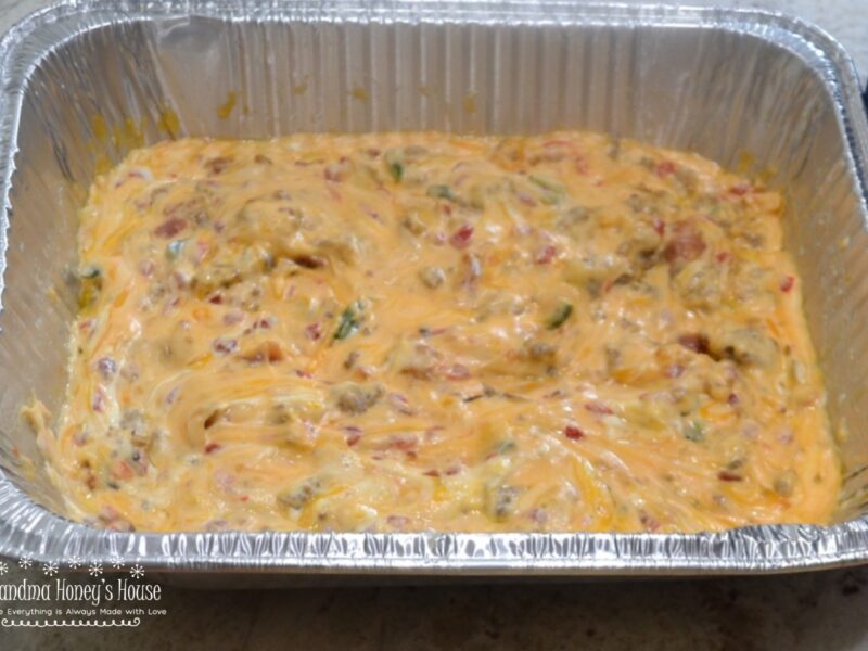 Smoky Sausage Pimento Cheese Dip is prepared on the grill and perfect for tailgates.