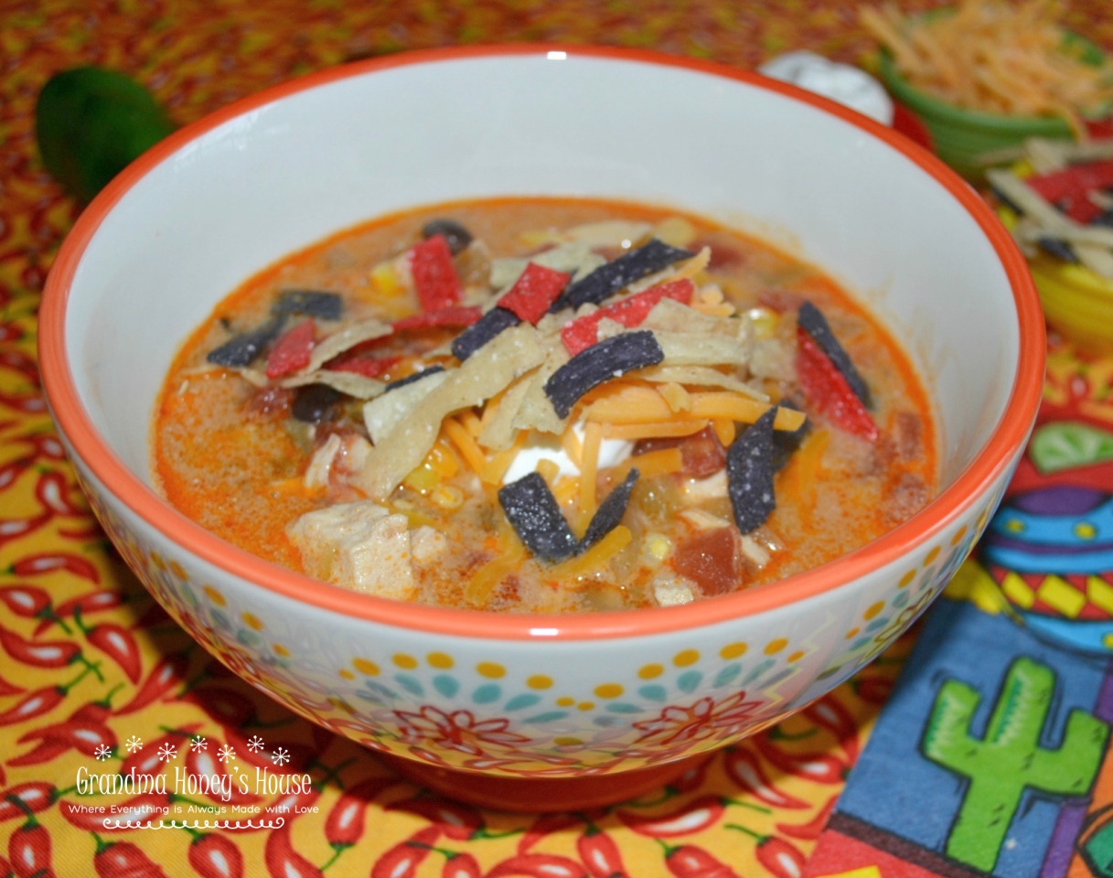 This Spicy Chicken Enchilada Soup is a flavorful, hearty soup with chicken, black beans, corn, tomatoes, green chilies, and enchilada sauce. It has plenty of Mexican-inspired flavor and a little kick of heat.