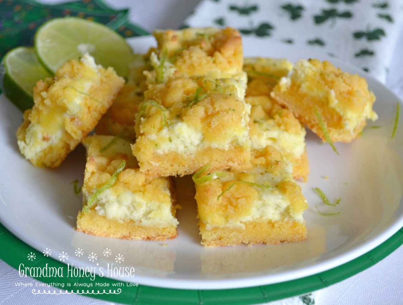 Easy cheesecake bars using a cake mix as a base, cream cheese and lime filling, topped with a crumble of the cake mix mixture.