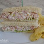 These ham salad sandwiches are made with cooked ham, dijon mustard, mayonnaise, swiss cheese, and sweet relish.