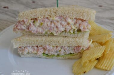 These ham salad sandwiches are made with cooked ham, dijon mustard, mayonnaise, swiss cheese, and sweet relish.