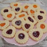 Filled and Stamped Shortbread Cookies, a beautiful cookie filled with preserves.