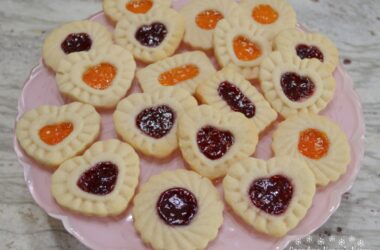 Filled and Stamped Shortbread Cookies, a beautiful cookie filled with preserves.