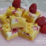 These Raspberry Lemon Cream Cheese Cake Bars are the perfect spring or summertime dessert.