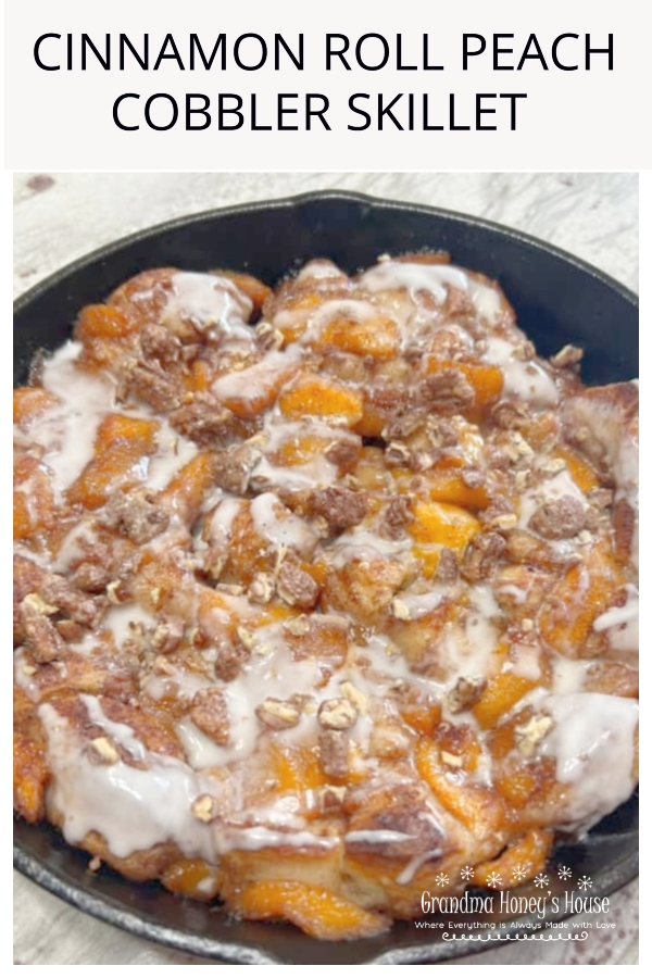 Cinnamon Roll Peach Cobbler Skillet.... a mixture of fresh peaches, cinnamon, sugar and vanilla, poured over a crust of refrigerated cinnamon rolls in a cast iron skillet and baked