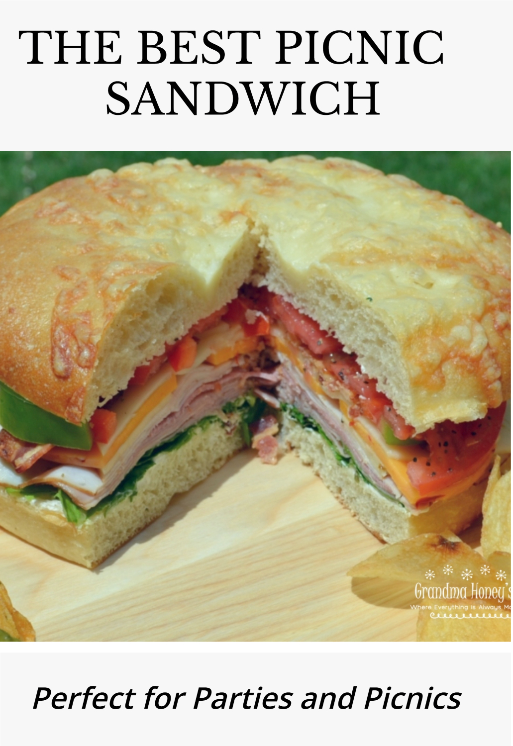 This Picnic Focaccia Sandwich is layered with a creamy onion and chive spread, stacked high with meats, cheeses, and fresh vegetables, then finished with a drizzle of zesty Italian dressing.
