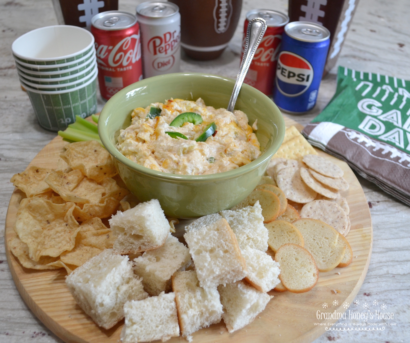 Cheesy Chicken Enchilada Dip is quick, creamy, hot dip loaded with cheeses, chicken, and a hit of heat.