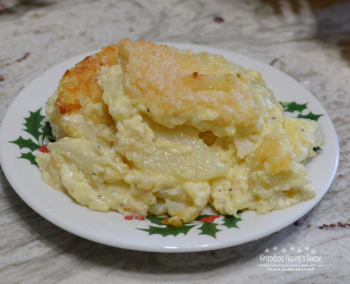 Greenbrier Garlic Potatoes are thinly sliced potatoes simmered in heavy cream, with fresh garlic, seasonings, eggs, and fresh parmesan cheese. They are then baked in this creamy sauce.