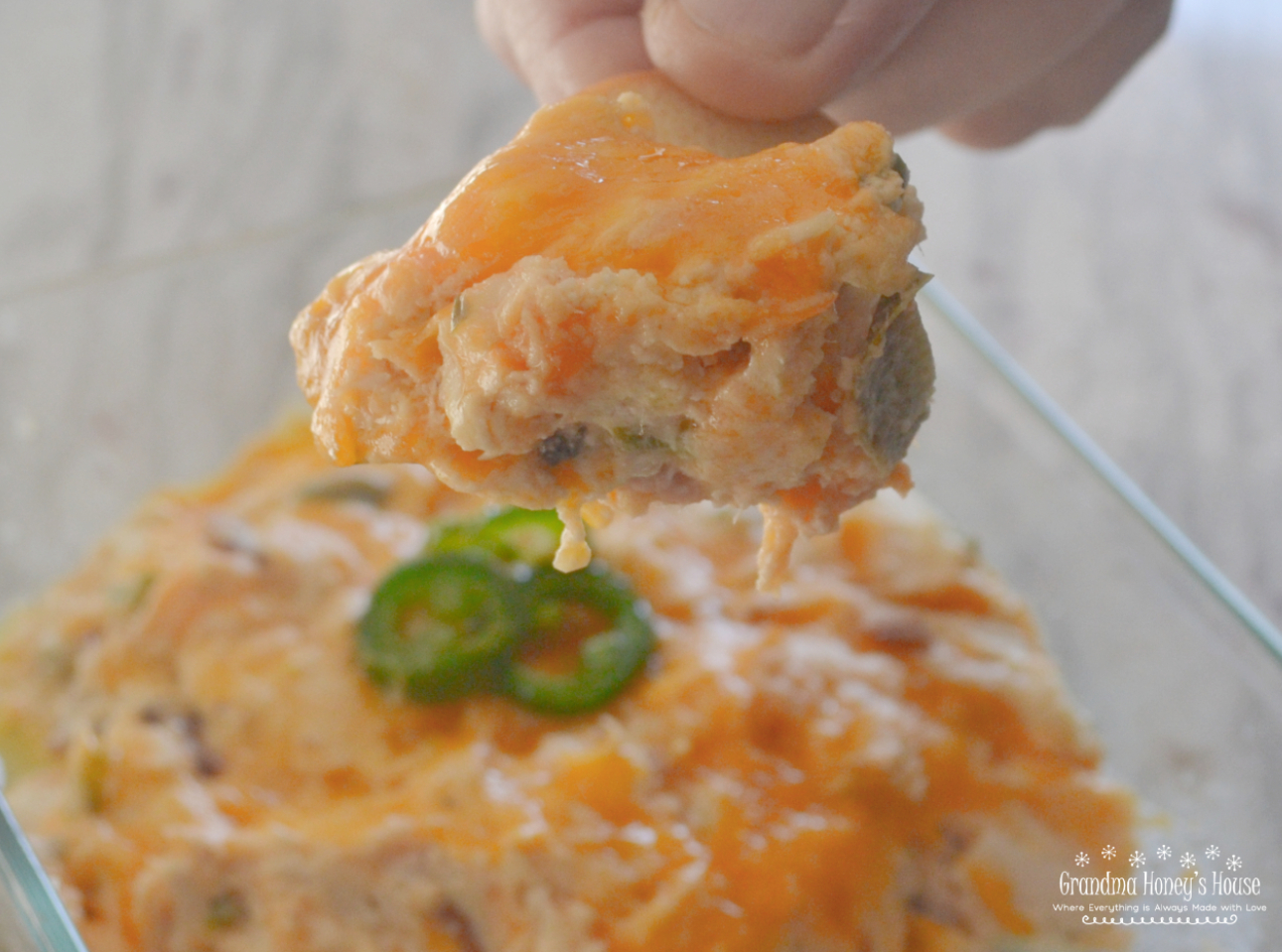 Rotisserie chicken, bacon, 2 kinds of cheese, fresh jalapenos, then baked, makes this Hot Chicken Jalapeno Dip the hit of any party.