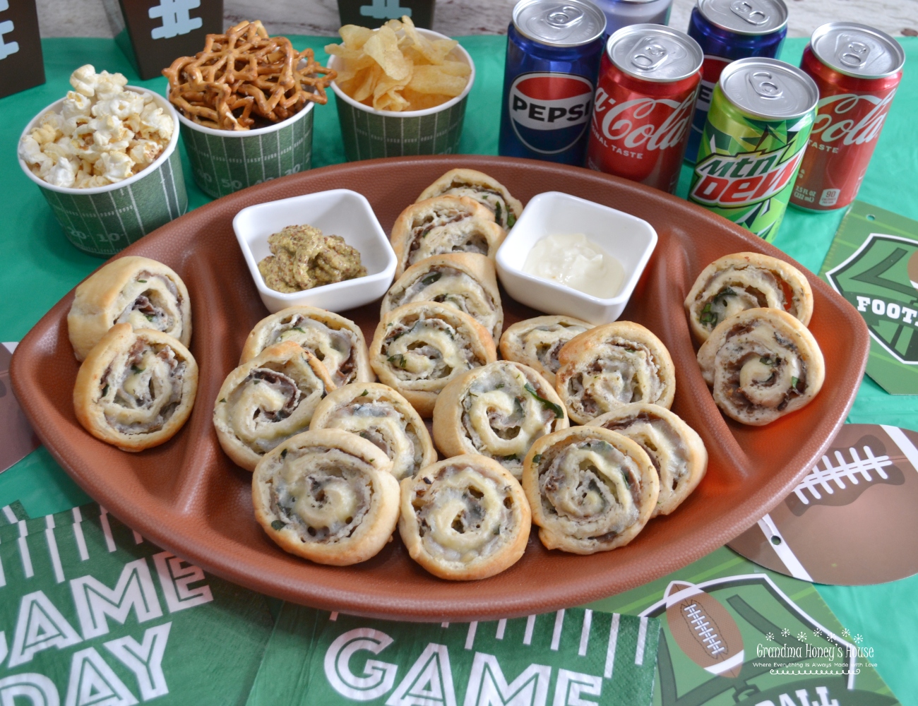 An easy, cheesy, appetizer loaded with roast beef, garlic and herb spread, smoked cheddar, and spinach, then baked in a buttery crescent dough. So many flavors in this quick and easy to make appetizer. 