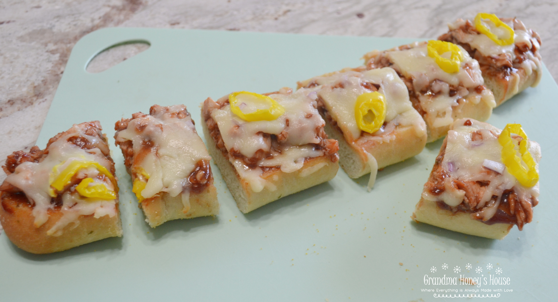 BBQ Chicken Garlic Bread Pizza ...frozen loaves of garlic bread, topped with  BBQ chicken, cheese, red onions, and banana peppers,  baked and ready to serve in minutes. 