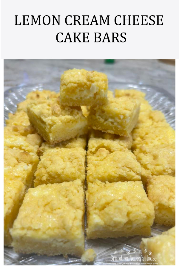 Easy cheesecake bars using a cake mix as a base, cream cheese and Lemon filling, topped with a crumble of the cake mix mixture.