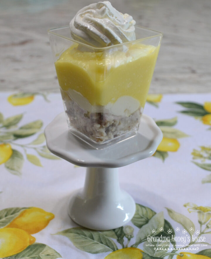 These Layered Lemon Pudding Cups are a cool, refreshing dessert made with creamy layers and bright lemon flavor.