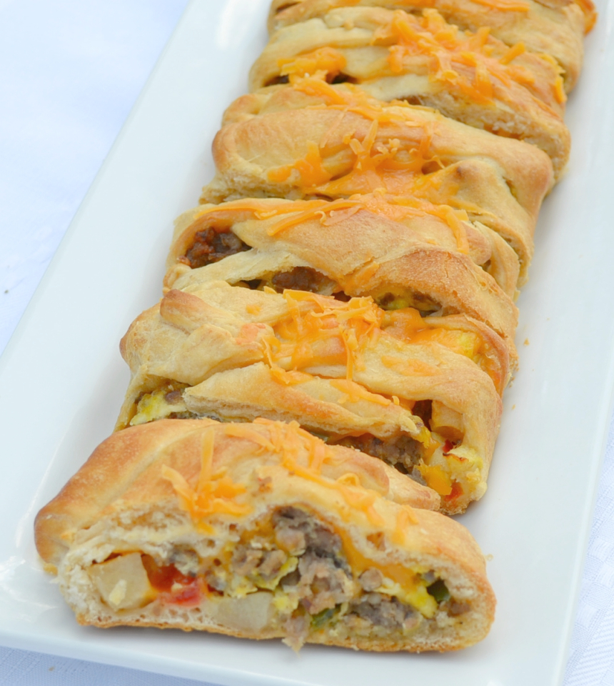 Sausage Apple Cheddar Brunch Braid is a breakfast filling wrapped up in a crescent dough and baked.