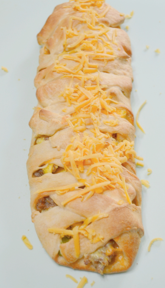 Sausage Apple Cheddar Brunch Braid is a breakfast filling wrapped up in a crescent dough and baked.