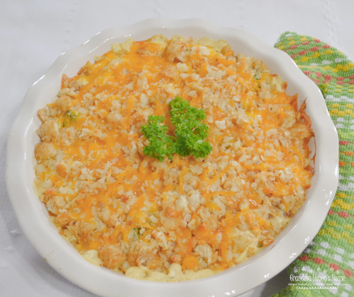 A creamy chicken casserole with bacon, ranch, broccoli and then topped with shredded tater tots and cheddar cheese. It is baked until cheese is melted and mixture is bubbly.
