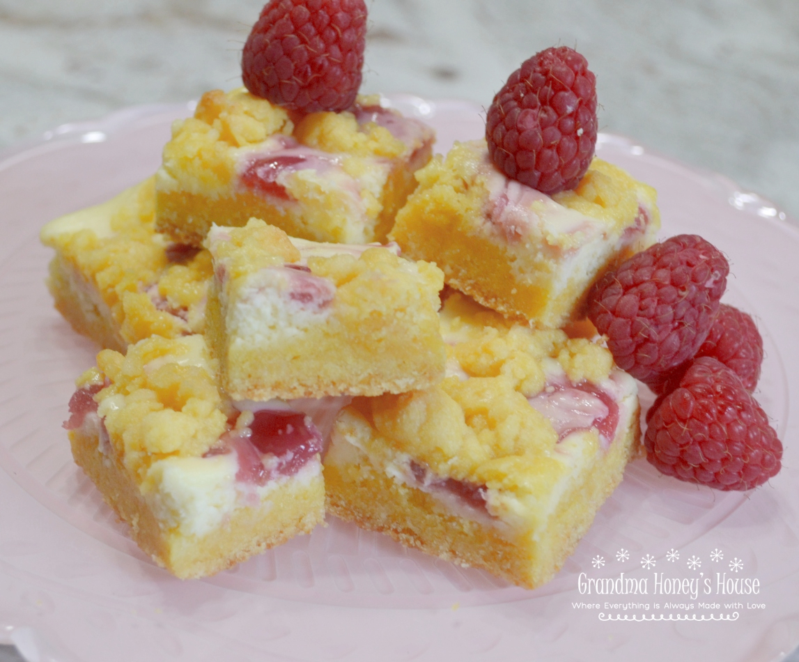These Raspberry Lemon Cream Cheese Cake Bars are the perfect spring or summertime dessert.