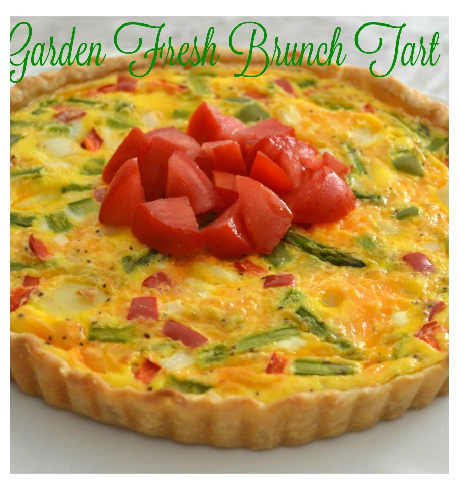 A delicious garden fresh brunch tart filled with fresh veggies, eggs and cheese. Perfect way to use those summer vegetables.