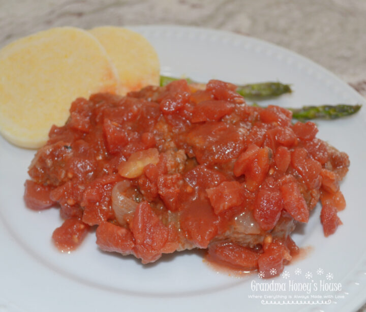 Swiss Steak cubed beef steaks are seasoned, browned, covered with onions, celery and diced Italian tomatoes, then baked until fork tender.